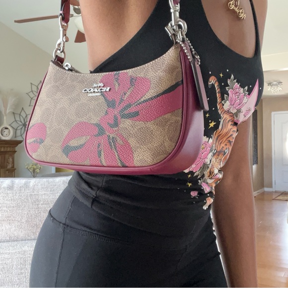 Coach Handbags - Coach Brown Signature Shoulder Bag with Pink Floral Accents